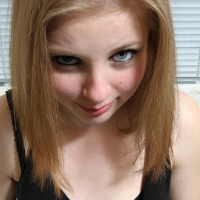 Cute babe Lil Candy loves to spread and finger her tiny cunt