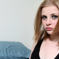 Cute babe Lil Candy loves to spread and finger her tiny cunt