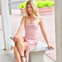 Gorgeous blonde Anikim Jones flashing her shaved pussy in public