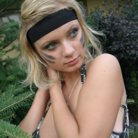 Busty Babe Malina May strips her sexy Army Outfit