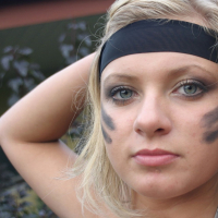 Busty Babe Malina May strips her sexy Army Outfit
