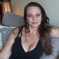 Amazing chick Diane Andrews strips and shows her big boobs
