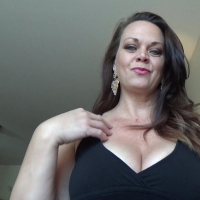 Amazing chick Diane Andrews strips and shows her big boobs