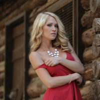 Shannyn XO visits a Log Cabin in a sexy red Dress