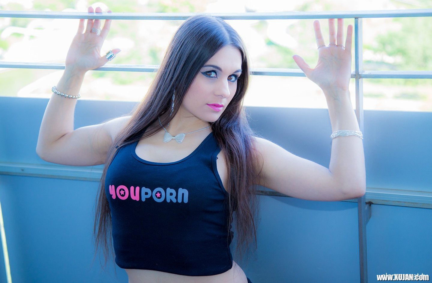 Lovely girl Clara Sweet posing in a black Youporn shirt on the balcony - Photo #3259112