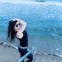 Gorgeous Clara Sweet showing her nice tits in a bra on the beach