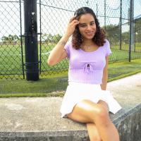 Naughty Isabella Jules having fun flashing her tits outdoors in public