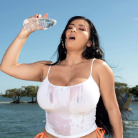 Gorgeous busty lady Selena Adams strips naked and gets off on a boat
