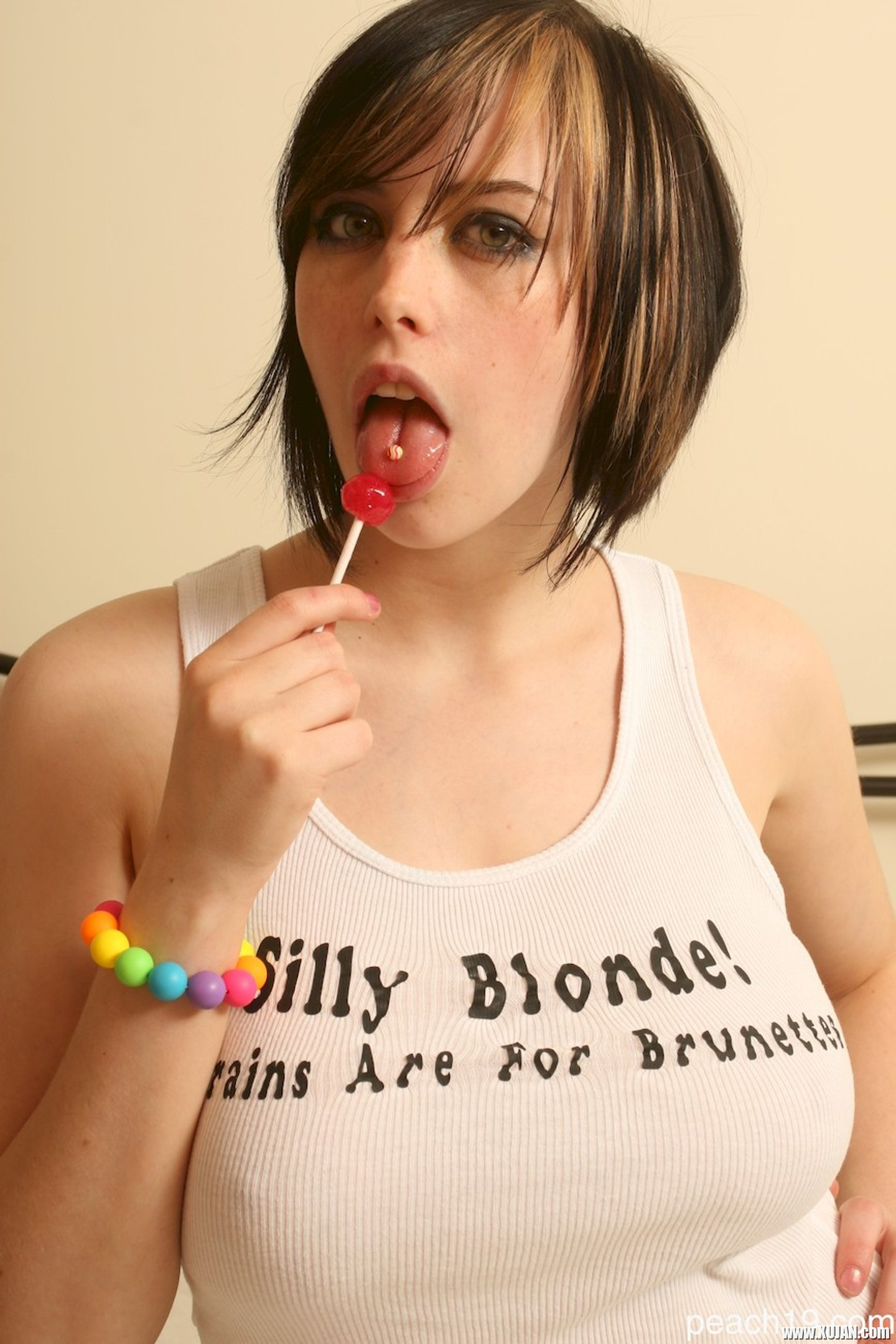 Pretty babe Mandy licking a lollipop and showing her big boobs - Photo #3264254