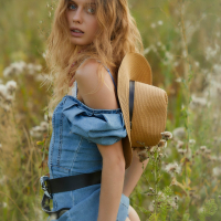 Gorgeous Amelie Lou teasing naked out in the field looking perfect