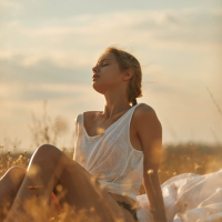 Beautiful Amelie Lou lies naked under the sun during hot photoshoot