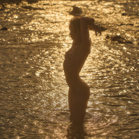 Stunning hot model Amelie Lou posing naked under the sun