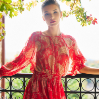 Beautiful model Anikim Jones gives an inviting look at the vineyard