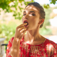 Beautiful model Anikim Jones gives an inviting look at the vineyard