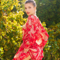 Beautiful model Anikim Jones gives an inviting look at the vineyard