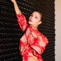 Beautiful model Anikim Jones gives an inviting look at the vineyard