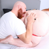 Redhead BBW Julie Ginger gets her pussy licked by a bearded guy