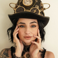 Steampunk chick Stevie Moon being surprised with a big schlong