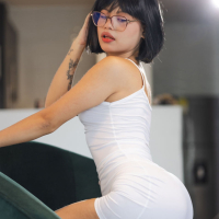Tattooed amateur Lilith Baph undressing and spreading legs on the chair