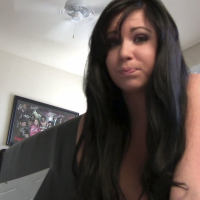 Chloe James playing on Cam with a Strapon Cock