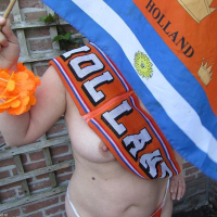 Horny MILF Nikki Holland shows off her body in a classic photoset