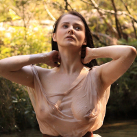 Aeryn Walker cools off her hot Body in a Stream