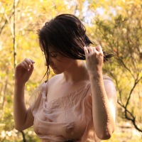 Aeryn Walker cools off her hot Body in a Stream
