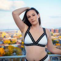 Lovely Clara Dee is exposing her big booty in sexy lingerie on the balcony