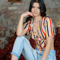 Sexy girl Viola Kat drops down her ripped jeans exposing naked curves