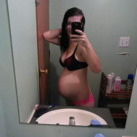 Pregnant chick Amanda Marks taking pictures of her sexy curves