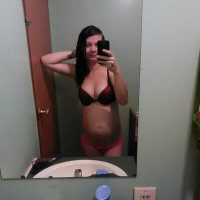 Pregnant chick Amanda Marks taking pictures of her sexy curves