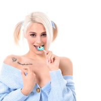 Blonde sweetie Christy White pleasing herself with a blue dildo