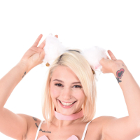 Playful blonde bunny Christy White plays with a pink dildo