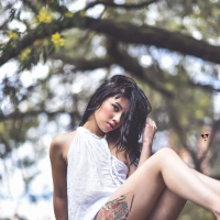 Sexy chick Jessica Alvarez teasing with her tattooed body