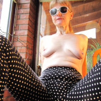 Nothing makes Doris Dawn happier than showing her mature tits