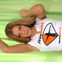 Karen Dreams posing in a Freeones Tshirt