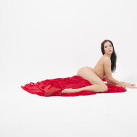 Lovenia Lux gets completely naked while posing erotically