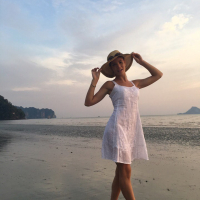 Sweet babe Lovenia Lux posing in a white dress on the beach