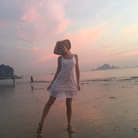 Sweet babe Lovenia Lux posing in a white dress on the beach