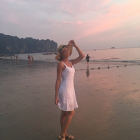 Sweet babe Lovenia Lux posing in a white dress on the beach