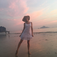Sweet babe Lovenia Lux posing in a white dress on the beach
