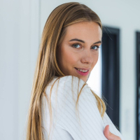 Bubble butt model Stefani Kovalyova playing with her ffrs on the sofa