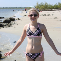 Teen Cutie Lil Candy gets dressed for a day at Daytona Beach