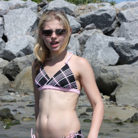 Teen Cutie Lil Candy gets dressed for a day at Daytona Beach