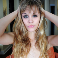 Lilly Luck gets naked and sticks her hot Ass in the Air