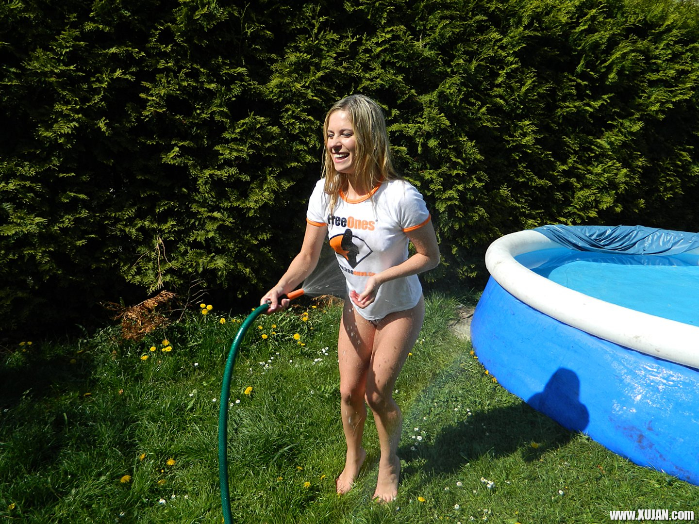 Young Leony Aprill soaks her FreeOnes Shirt all Wet - Photo #3345164