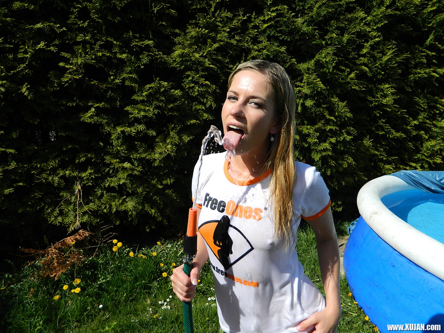 Young Leony Aprill soaks her FreeOnes Shirt all Wet - Photo #3345170