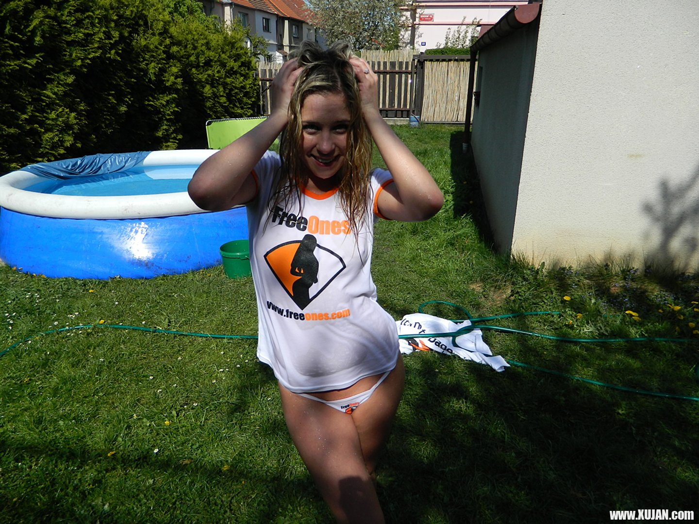 Young Leony Aprill soaks her FreeOnes Shirt all Wet - Photo #3345179