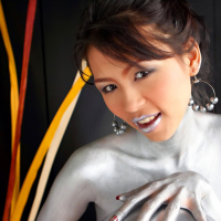Naomi Chatee covered in Body Paint toying her Cunt