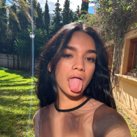 Erotic model Dulce shows her perfect tits and bubble butt outdoors